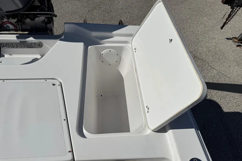 Slide: The Image of Open storage compartment on a 2016 Sportsman Island Bay 20 boat. - 14