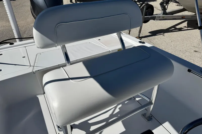 Slide: The Image of 2016 Sportsman Island Bay 20 boat seat with white upholstery and metal frame. - 18