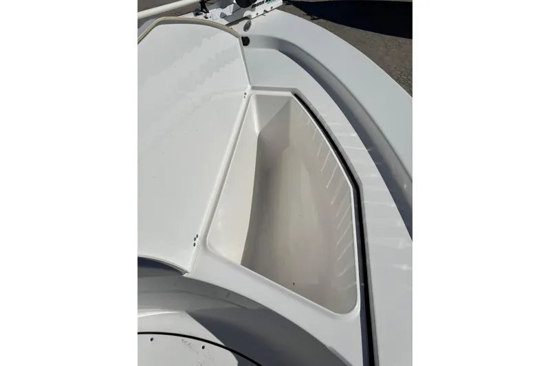 Slide: The Image of Open storage compartment on a 2016 Sportsman Island Bay 20 boat. - 27