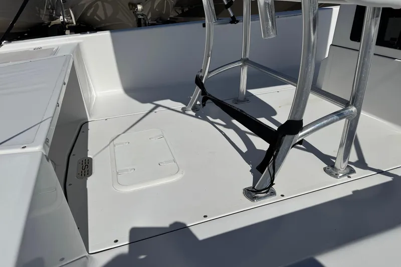 Slide: The Image of 2016 Sportsman Island Bay 20 boat interior with seating and metal frame. - 3