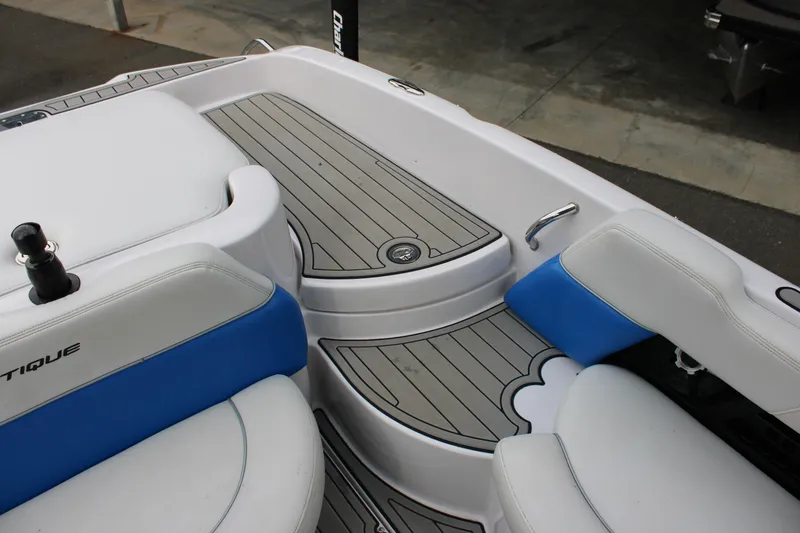 Slide: The Image of 2010 Correct Craft AIR NAUTIQUE SV 211 boat interior with blue and white seating. - 15