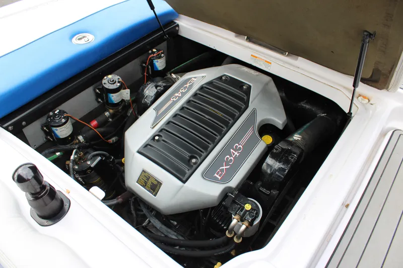 Slide: The Image of 2010 Correct Craft AIR NAUTIQUE SV 211 engine compartment with EX343 engine. - 19