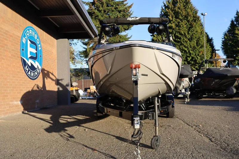 Slide: The Image of 2022 Tigé Z3 boat on trailer at Bjornson Marine dealership. - 10