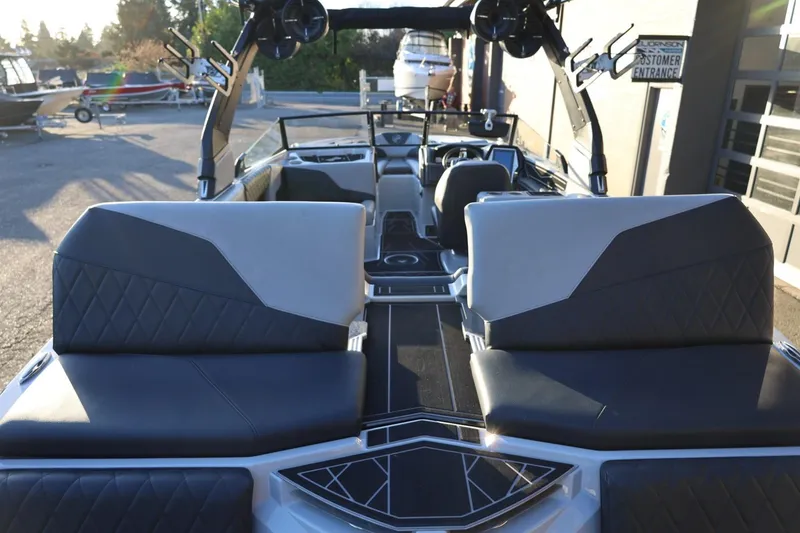 Slide: The Image of 2022 Tigé Z3 boat interior with stylish seating and modern design features. - 17