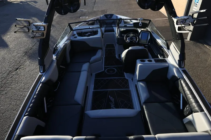 Slide: The Image of 2022 Tigé Z3 boat interior with sleek seating and modern dashboard design. - 20