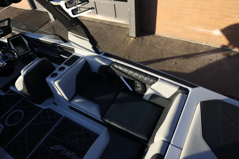 Slide: The Image of 2022 Tigé Z3 boat interior with modern seating and dashboard design. - 22