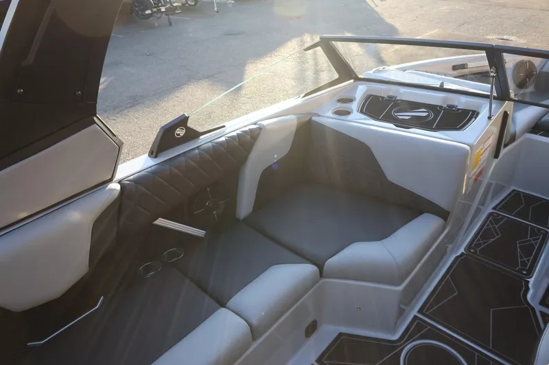 Slide: The Image of 2022 Tigé Z3 boat interior with sleek seating and modern design elements. - 23