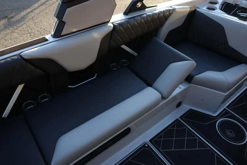 Slide: The Image of 2022 Tigé Z3 boat interior with luxurious seating and modern design. - 26