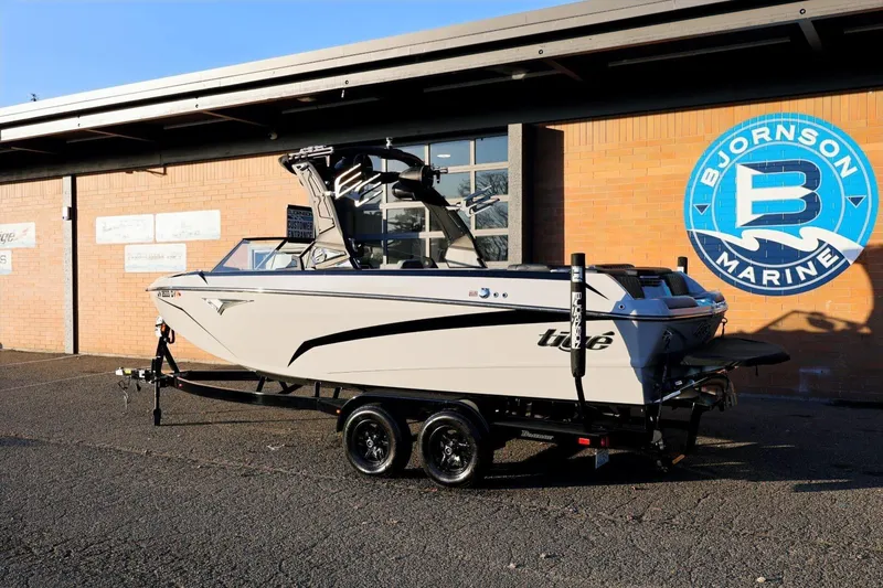 Slide: The Image of 2022 Tigé Z3 boat on trailer at Bjornson Marine dealership. - 3