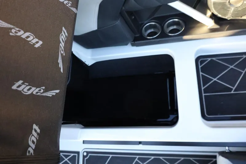 Slide: The Image of Interior of 2022 Tigé Z3 boat with branded upholstery and cup holders. - 31