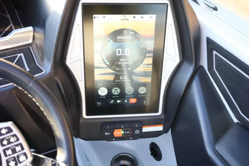Slide: The Image of 2022 Tigé Z3 boat dashboard with touchscreen display and control panel. - 34