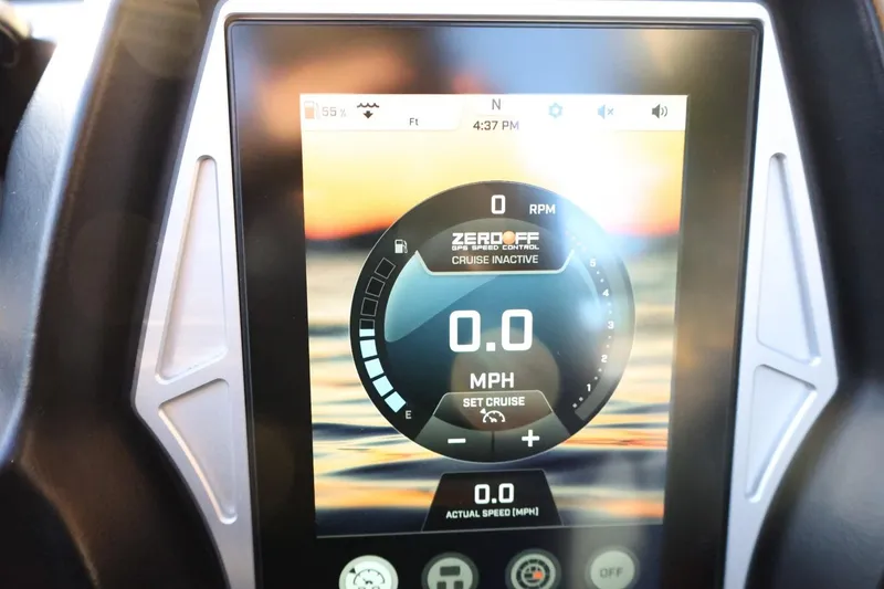 Slide: The Image of 2022 Tigé Z3 dashboard display showing GPS speed control and cruise settings. - 35