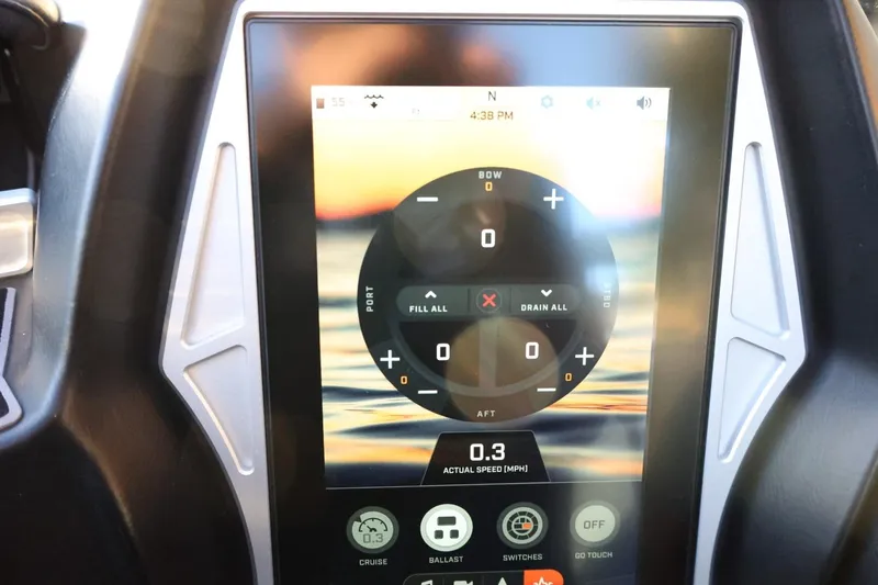Slide: The Image of 2022 Tigé Z3 boat touchscreen control panel displaying ballast settings. - 36