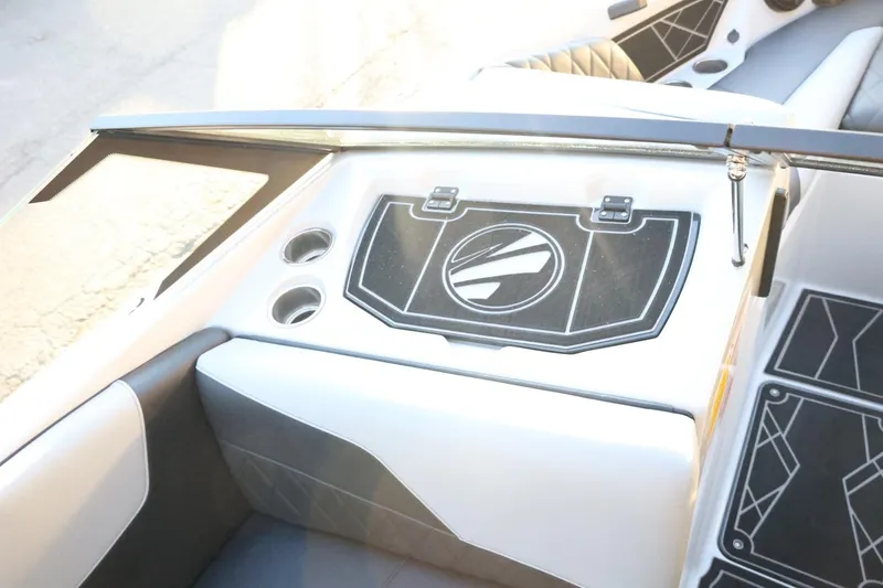 Slide: The Image of 2022 Tigé Z3 boat interior with sleek design and cup holders. - 42