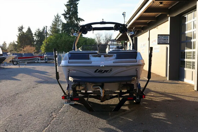 Slide: The Image of 2022 Tigé Z3 boat parked outside dealership, rear view. - 5