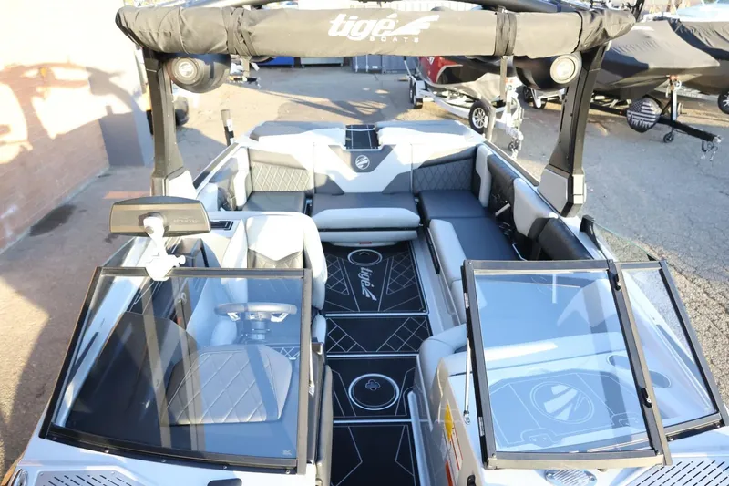 Slide: The Image of 2022 Tigé Z3 boat interior with modern seating and sleek design. - 50