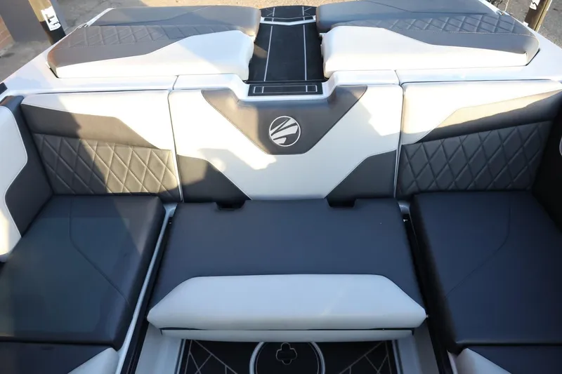 Slide: The Image of 2022 Tigé Z3 boat interior with stylish black and white seating design. - 51