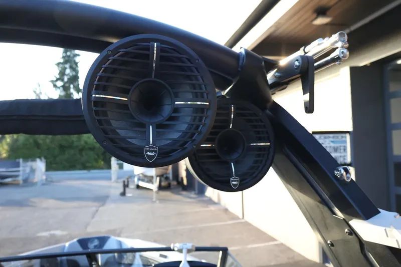 Slide: The Image of 2022 Tigé Z3 boat with mounted speakers, showcasing premium audio equipment. - 53