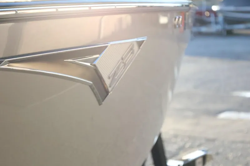 Slide: The Image of 2022 Tigé Z3 boat emblem in sunlight, showcasing sleek design. - 55