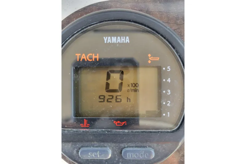 Slide: The Image of Yamaha tachometer displaying 926 hours on a 2008 Cobia 236 Walk Around boat. - 10