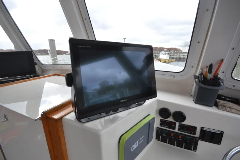 Slide: The Image of Pilothouse interior of 2008 Wayne Beal EXPRESS boat with Garmin GPS display. - 29