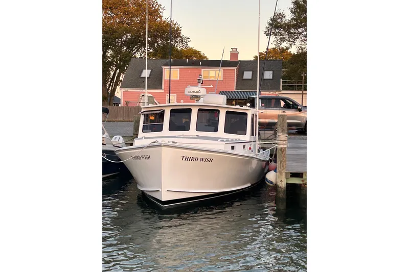 Slide: The Image of 2008 Wayne Beal EXPRESS boat "Third Wish" docked at a marina. - 4