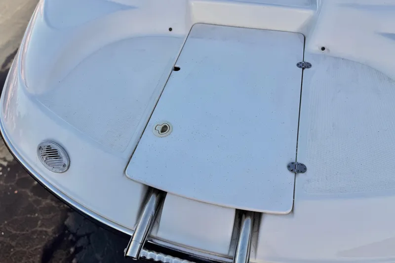 Slide: The Image of 2004 Glastron DX 235 Deckboat swim platform with ladder and drainage vent. - 10