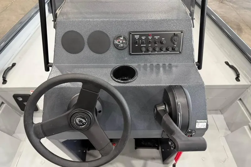 Slide: The Image of 2026 Crestliner 1870 Retriever FCC boat interior with storage compartments and seating. - 11