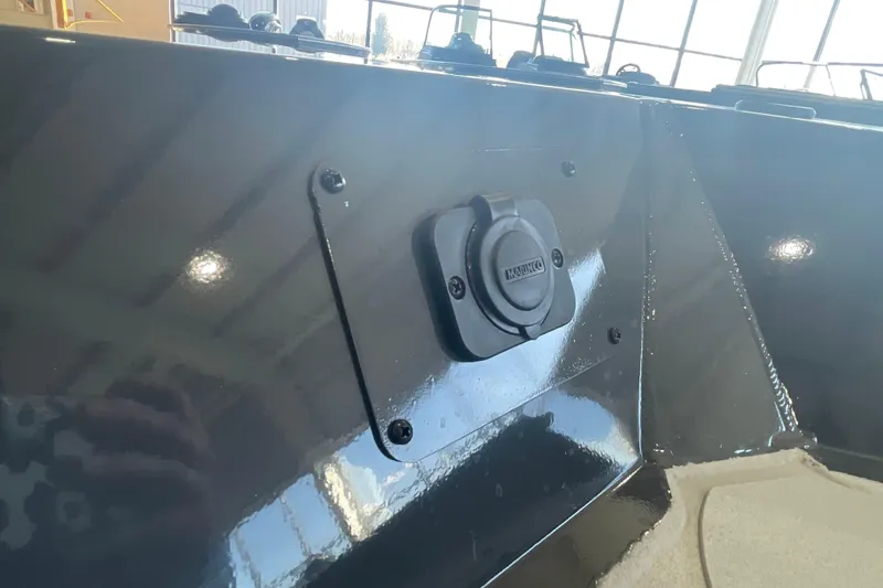 Slide: The Image of Rod holders on 2026 Crestliner 1870 Retriever FCC boat, with safety instructions visible. - 18