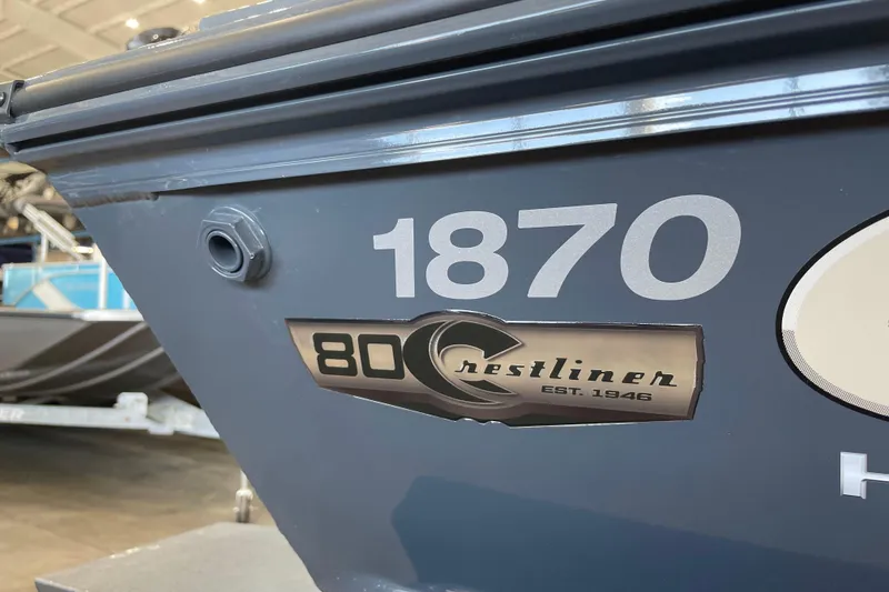 Slide: The Image of 2026 Crestliner 1870 Retriever FCC boat interior with storage compartments. - 20