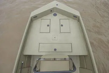 Slide: The Image of Manufacturer Provided Image: 2026 Crestliner 1870 Retriever FCC boat deck on calm water. - 33