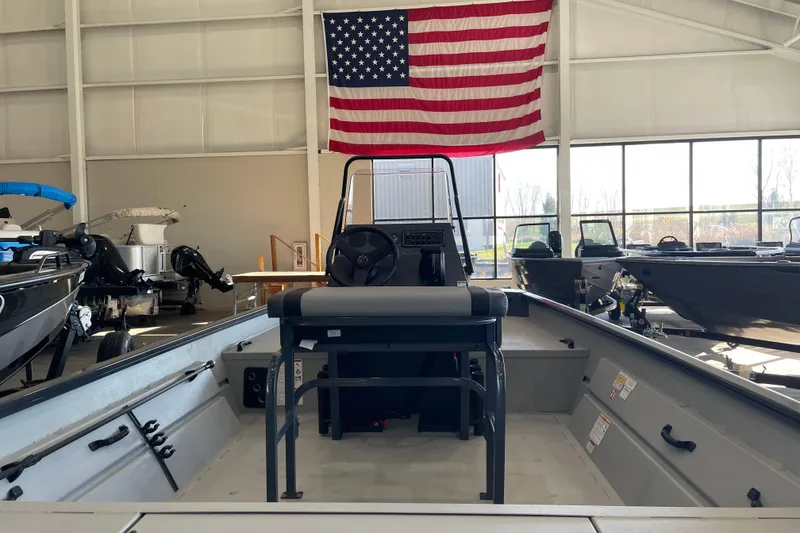 Slide: The Image of 2026 Crestliner 1870 Retriever FCC boat with Mercury engine in showroom. - 4