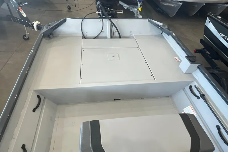 Slide: The Image of 2026 Crestliner 1870 Retriever FCC boat with Mercury 80 engine in showroom. - 6