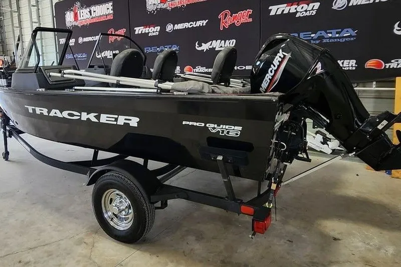 Slide: The Image of 2025 Tracker Pro Guide V-16 WT boat with Mercury engine on display. - 8