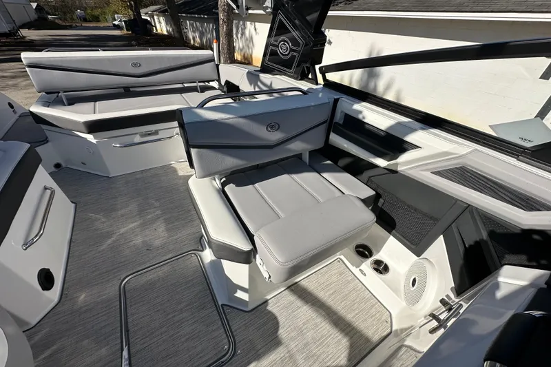 Slide: The Image of 2023 Cobalt R6 Surf boat interior with sleek seating and modern design. - 13