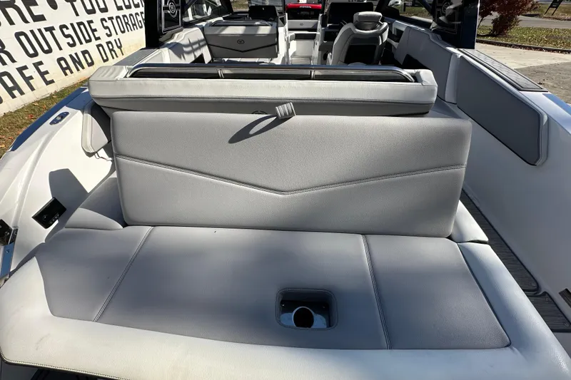 Slide: The Image of 2023 Cobalt R6 Surf boat interior with gray seating and modern design. - 16