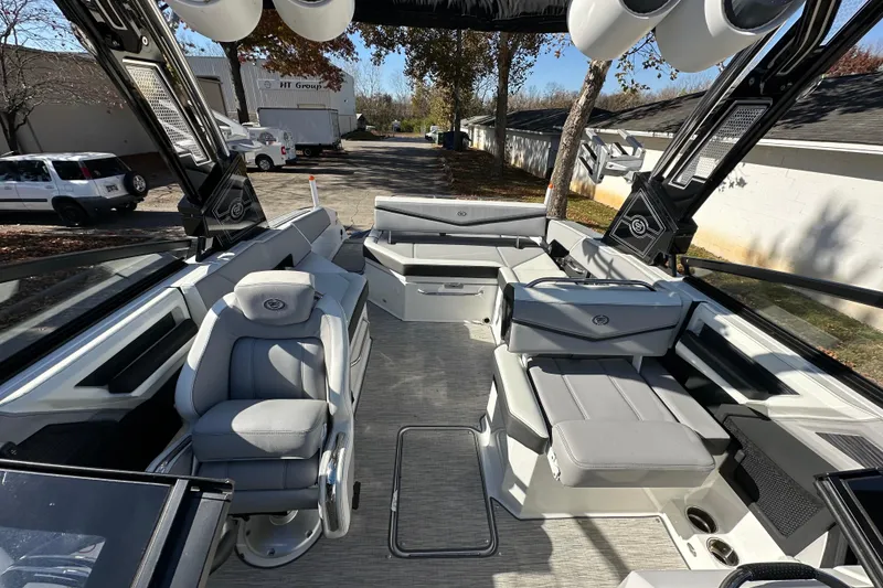 Slide: The Image of 2023 Cobalt R6 Surf boat interior with luxurious seating and modern design. - 5