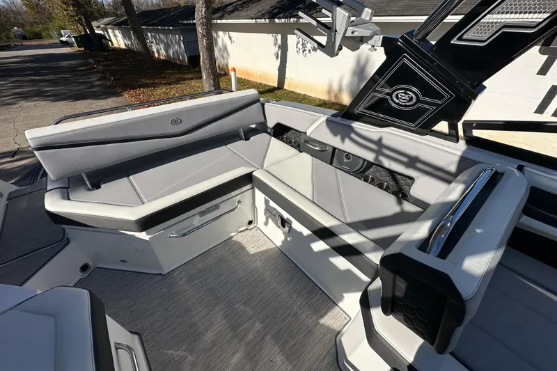 Slide: The Image of 2023 Cobalt R6 Surf boat interior with sleek seating and modern design. - 6