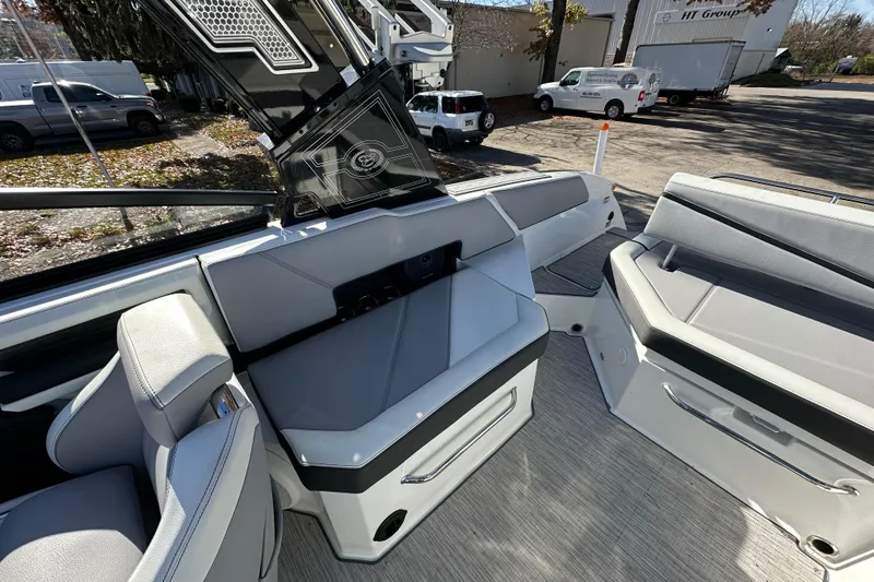 Slide: The Image of 2023 Cobalt R6 Surf boat interior with sleek seating and modern design. - 7