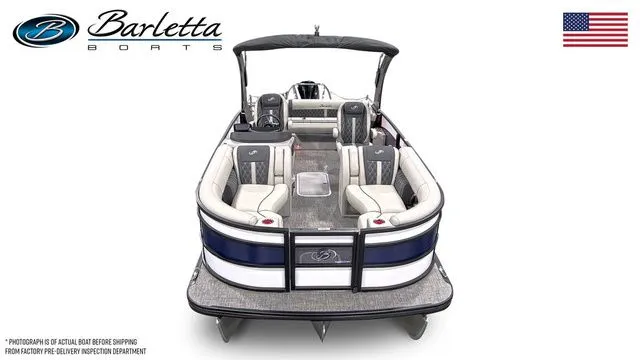 Slide: The Image of 2026 Barletta Lusso 23UCA luxury pontoon boat, front view, elegant seating, American flag. - 5