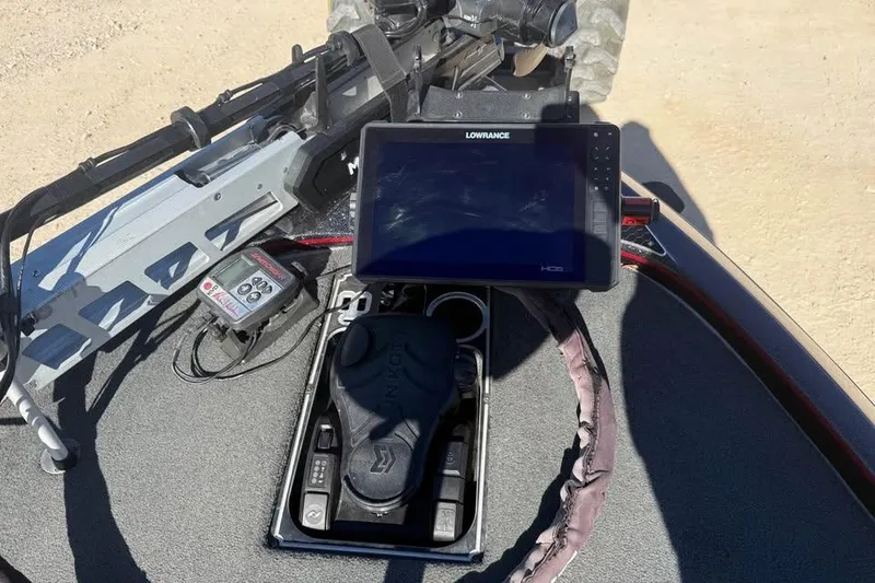 Slide: The Image of 2018 Skeeter FX21 Limited Edition boat dashboard with Lowrance HDS display and controls. - 14