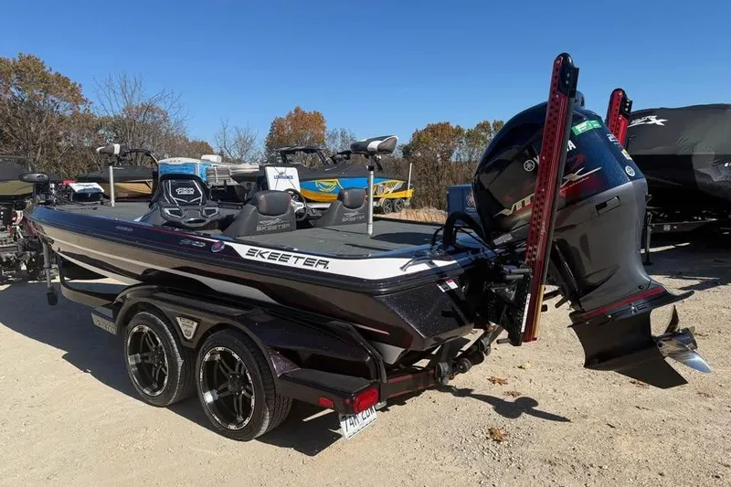 Slide: The Image of 2018 Skeeter FX21 Limited Edition boat with Yamaha outboard motor on trailer. - 7