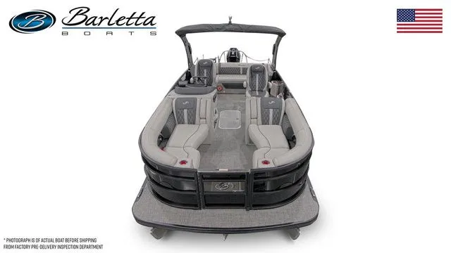 Slide: The Image of 2026 Barletta Lusso 23UCA pontoon boat, luxury seating, sleek design, American flag, Barletta logo. - 5