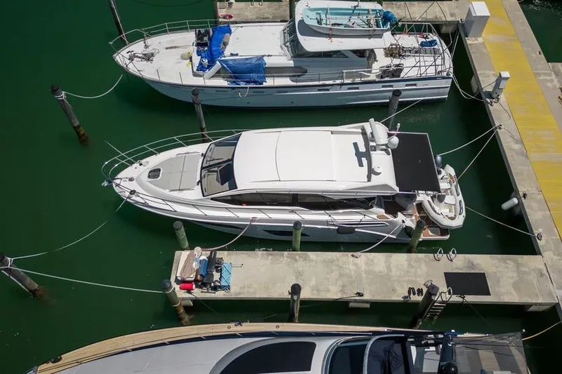 Slide: The Image of 2017 Sea Ray Sundancer 460 yacht docked at marina, aerial view. - 102
