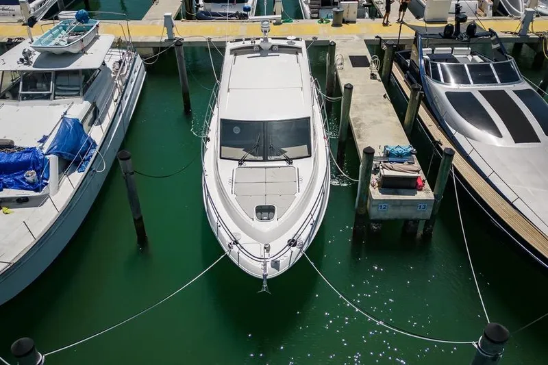 Slide: The Image of 2017 Sea Ray Sundancer 460 yacht docked at marina, aerial view. - 107