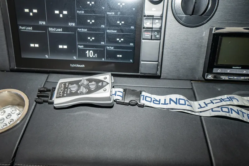 Slide: The Image of Control panel of 2017 Sea Ray Sundancer 460 yacht with digital display and remote. - 17