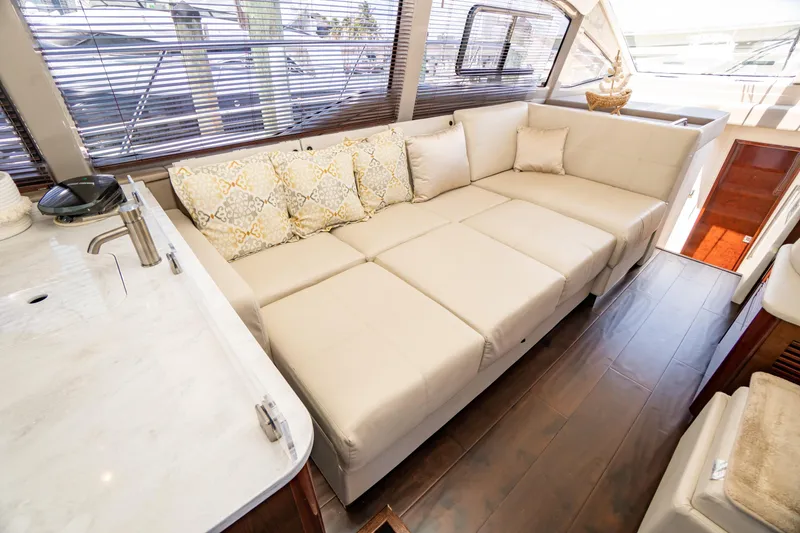 Slide: The Image of Luxurious interior of 2017 Sea Ray Sundancer 460 yacht with plush seating and elegant decor. - 3