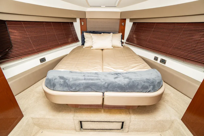 Slide: The Image of Luxurious cabin interior of 2017 Sea Ray Sundancer 460 yacht with cozy bedding. - 44