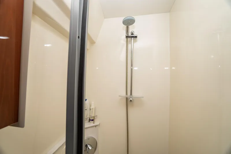 Slide: The Image of Shower area in 2017 Sea Ray Sundancer 460 yacht, featuring modern fixtures. - 51