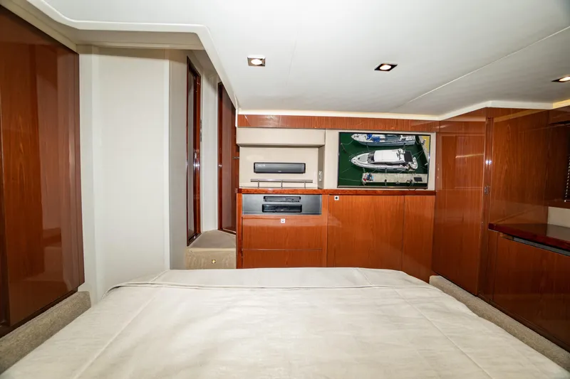 Slide: The Image of Luxurious interior of 2017 Sea Ray Sundancer 460 yacht with wood paneling and modern amenities. - 55